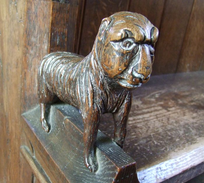 Wimbotsham Norfolk St Mary bench end human faced quadruped